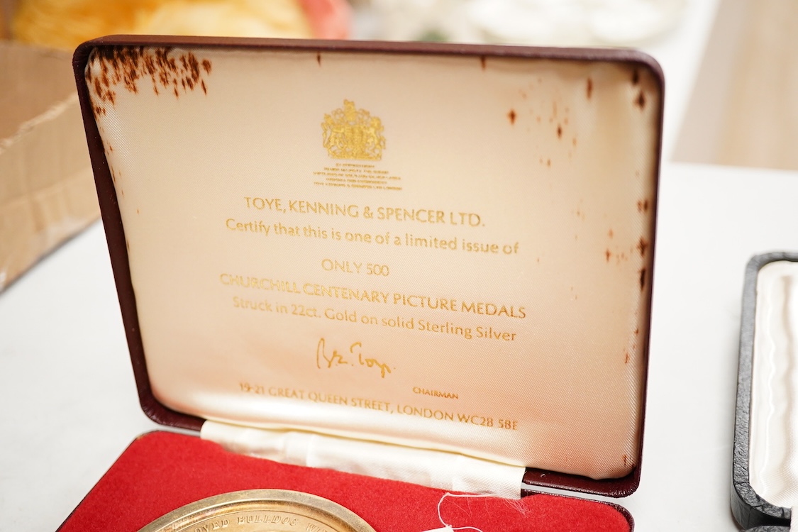 A cased engine turned sterling cigarette case, 11.4cm, a George V silver cigarette case and a cased commemorative limited edition silver gilt Churchill Centenary Picture Medal.